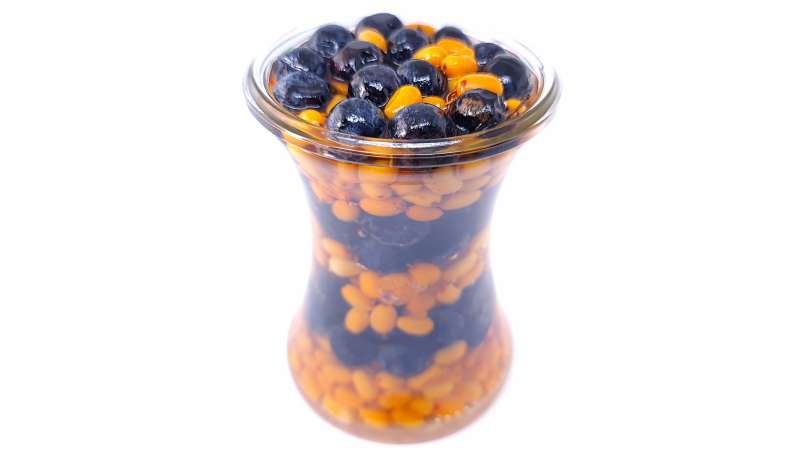 Sea buckthorn and sloes berries macerated in honey, photo 3
