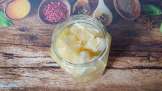 Macerated lemon with honey in the jar: tonic, immune, liver